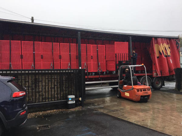 First load of cages stored in truck